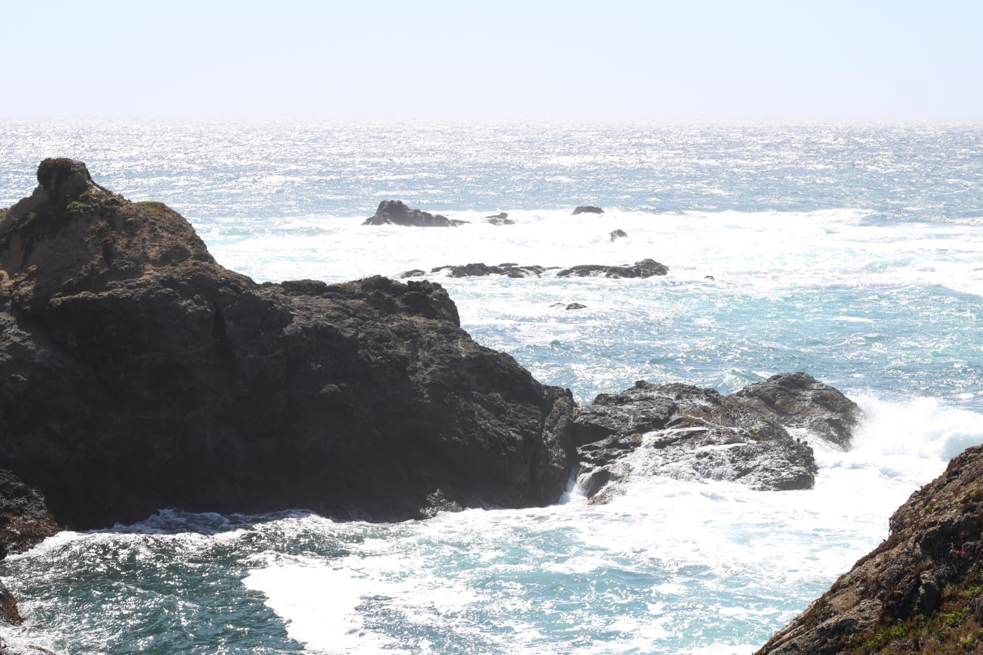 Rocky Mendocino headlands with white surf and turquoise water