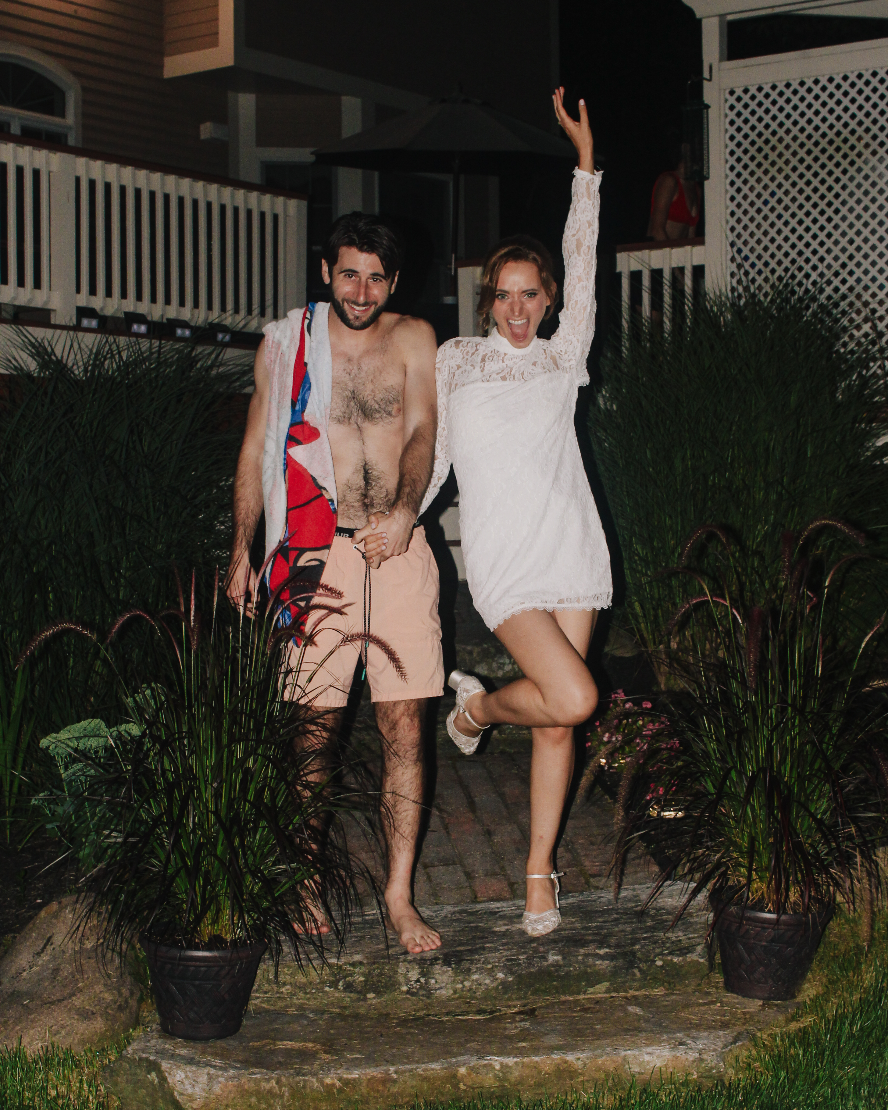 Caroline and Jamie celebrating in swimwear at the after-party pool party